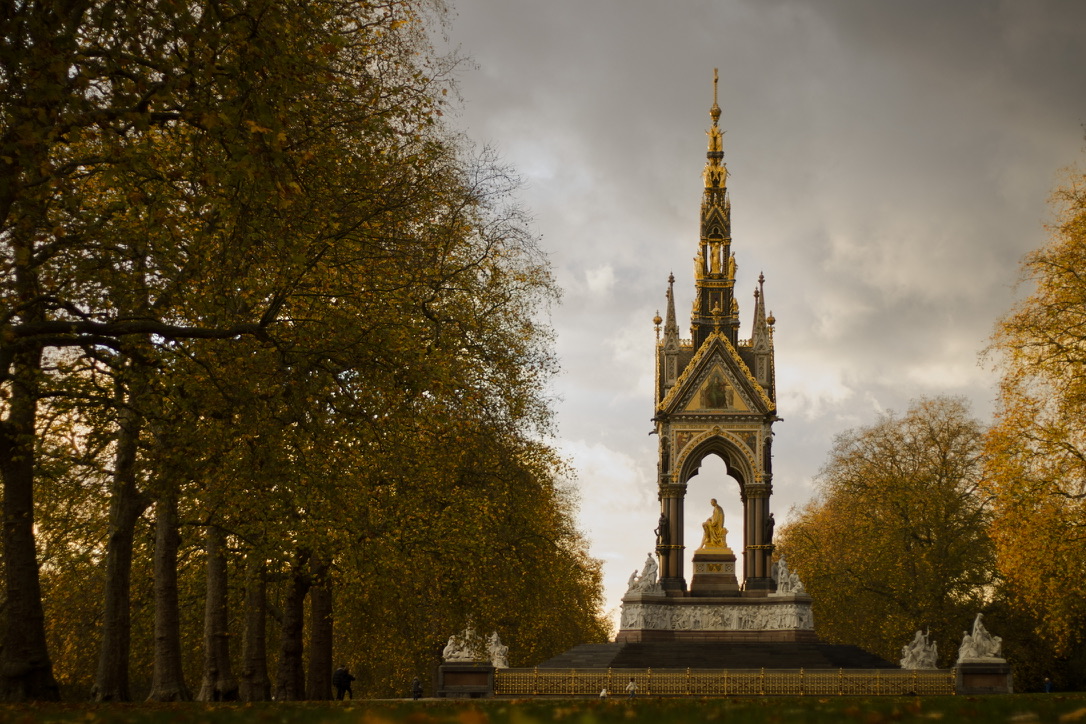 Gothic geometries rising beneath a heavy autumn canopy.