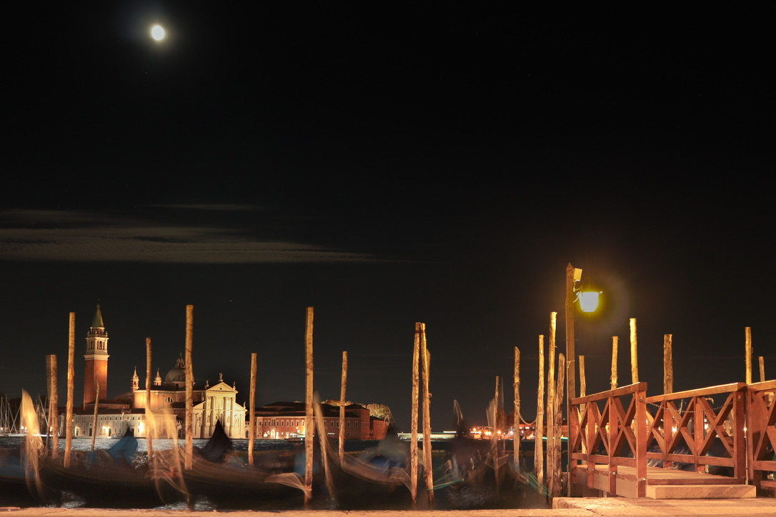 Moored structures reflecting the weight of an empty basin.